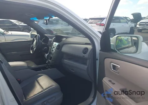 2010 Honda Pilot Touring z USA, uszkodzony, nr VIN 5FNYF3H9XAB012682